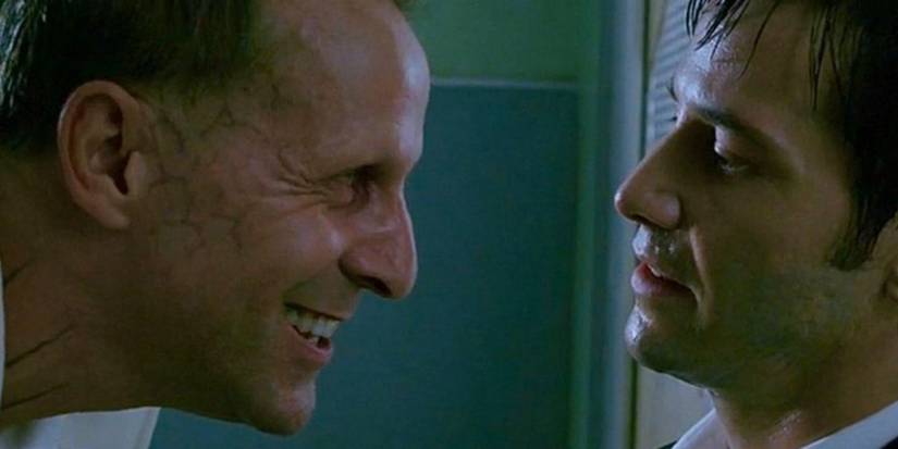 Keanu Reeves as Constantine facing Lucifer