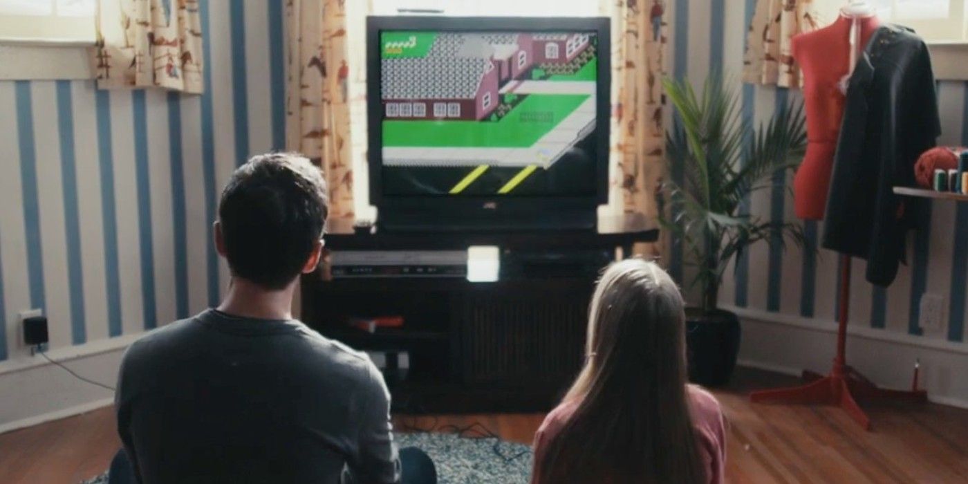 8-Bit Christmas Jake and daughter playing Paperboy 