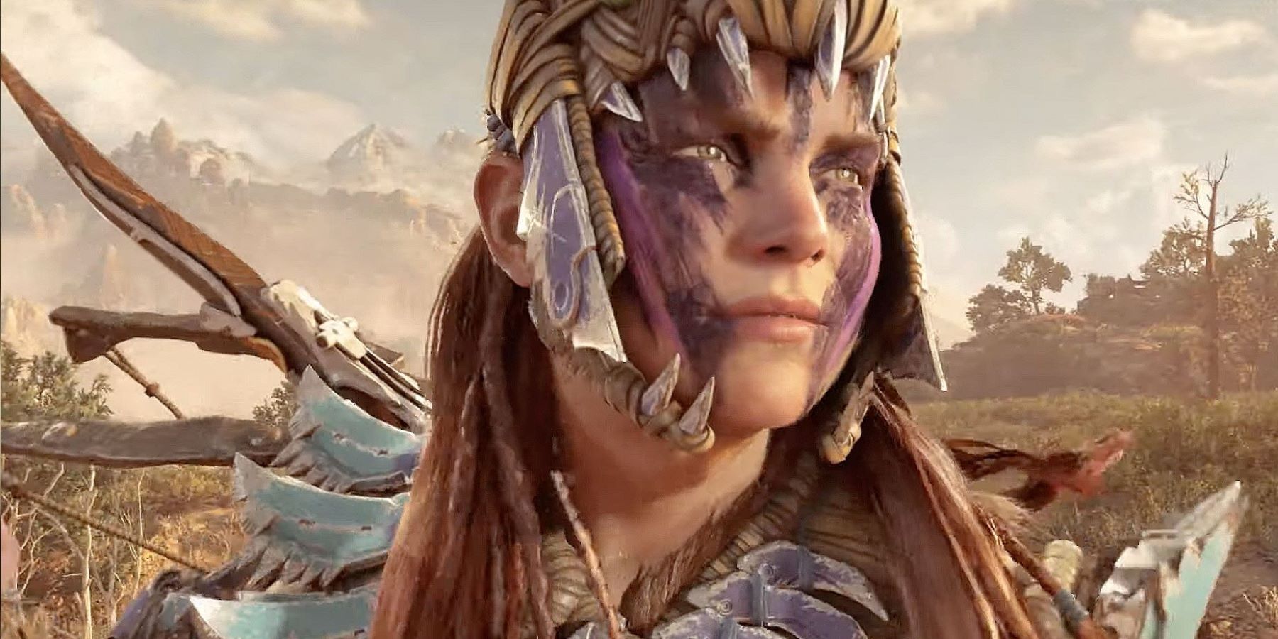 Aloy wearing a new set of armor and face paint in Horizon Forbidden West