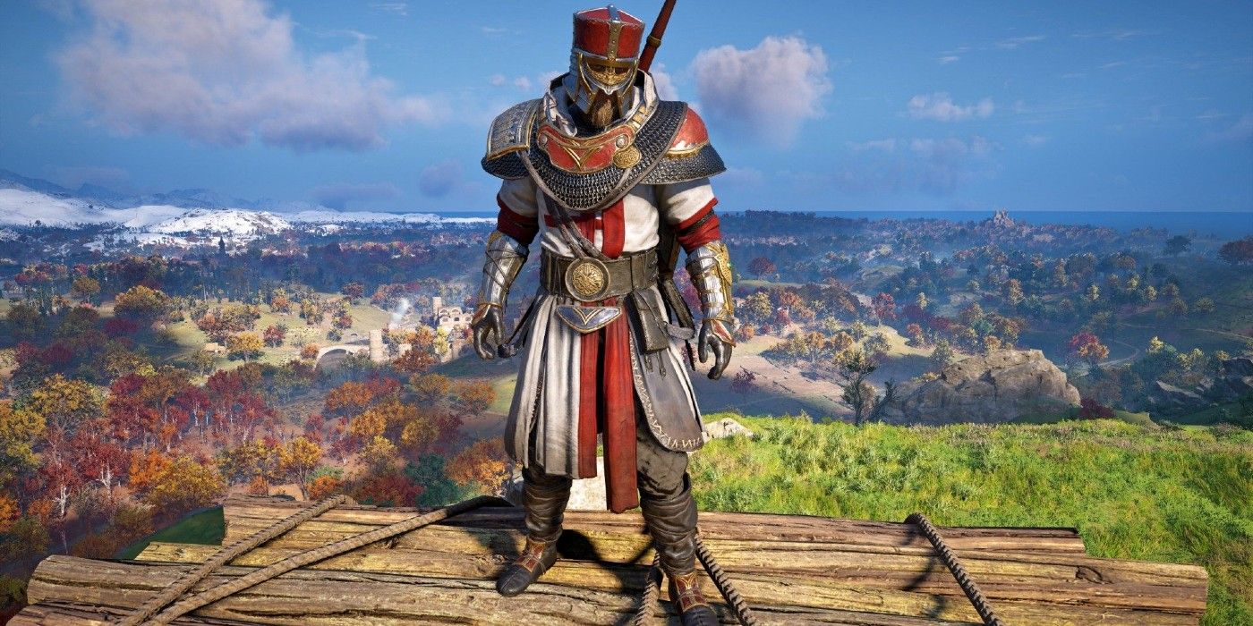 Assassin's Creed Valhalla wearing Saint George's Armor against skyline