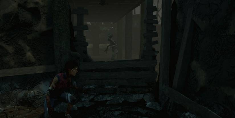 A survivor hiding from The Hag in Dead By Daylight