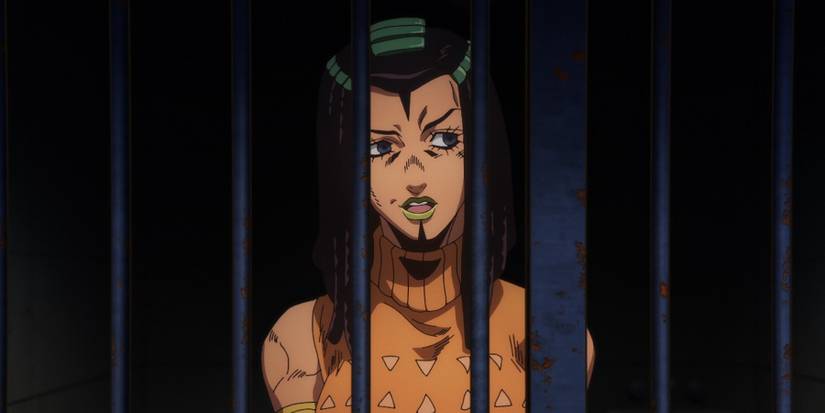 Ermes Costello behind bars
