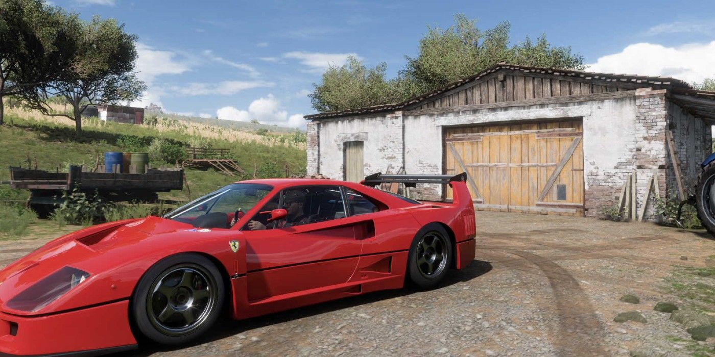 Forza Horizon 5 Ferrari Barn Find with red Ferrari parked outside barn