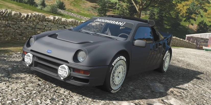 Forza Horizon 5 Hoonigan Ford RS200 Evolution three quarter view near stone wall with greenery