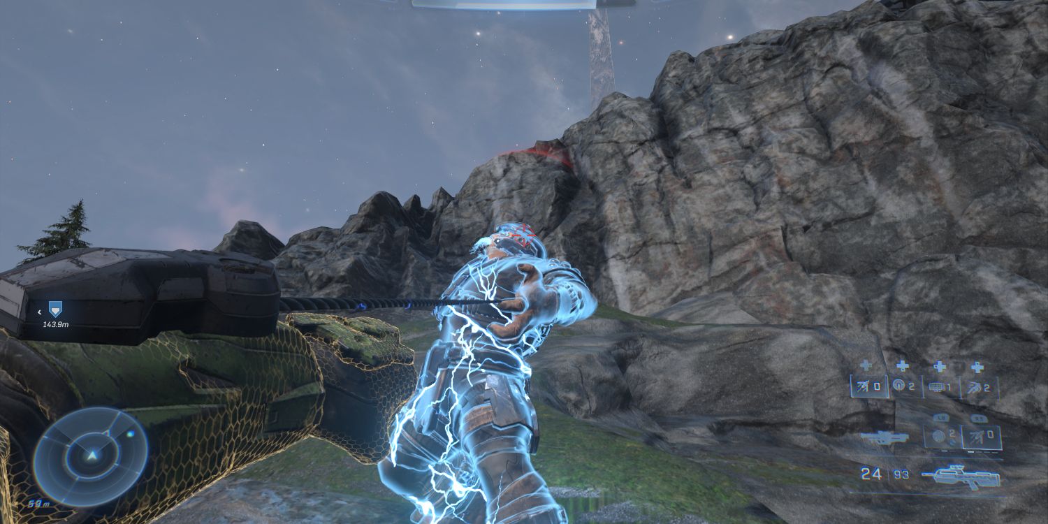 a left arm in green armor shoots a cable from an attachment that connects to a figure being shocked with blue and white electricity 