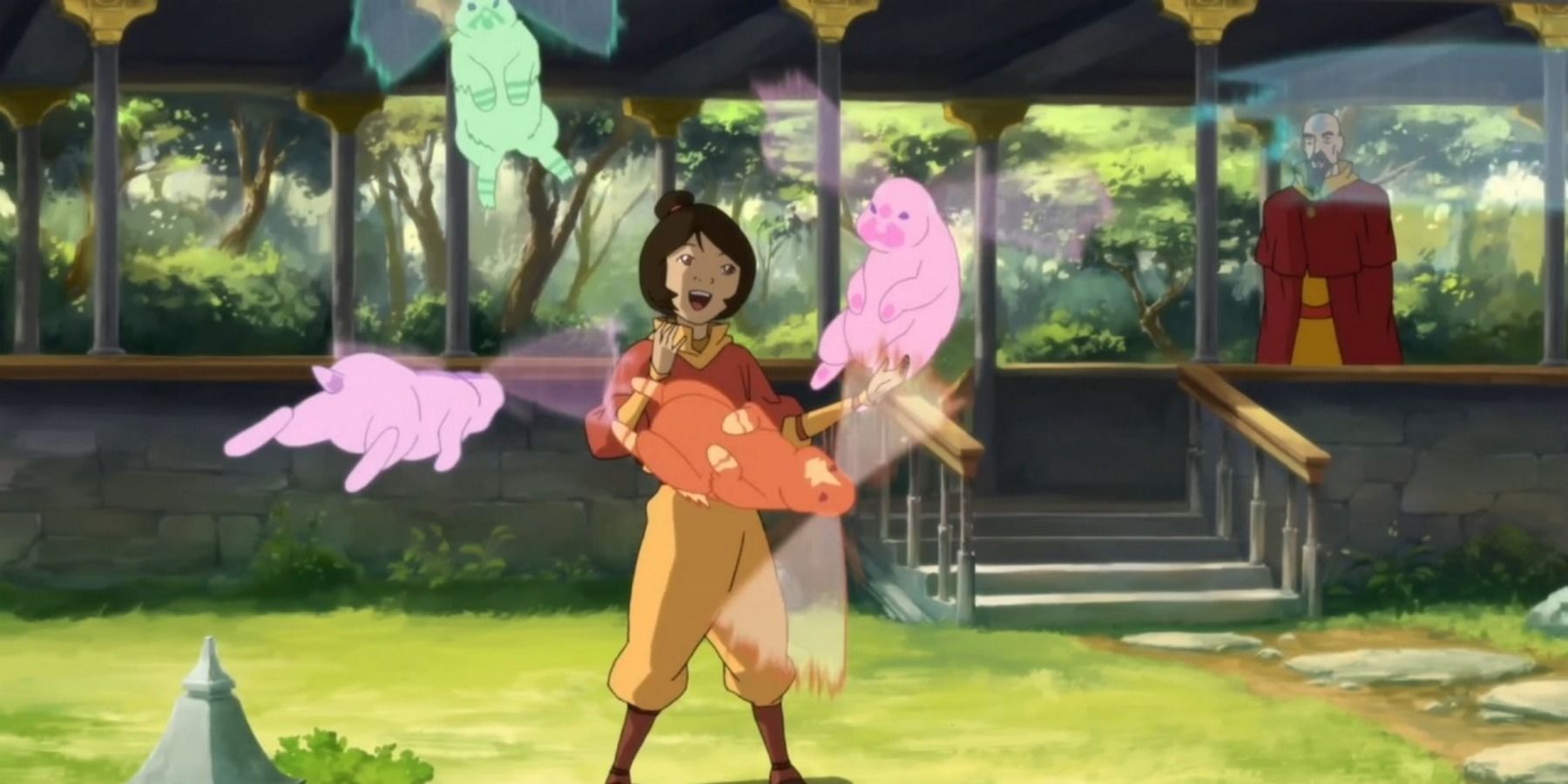 Jinora Legend of Korra playing with spirit bunnies with Tenzin in the background