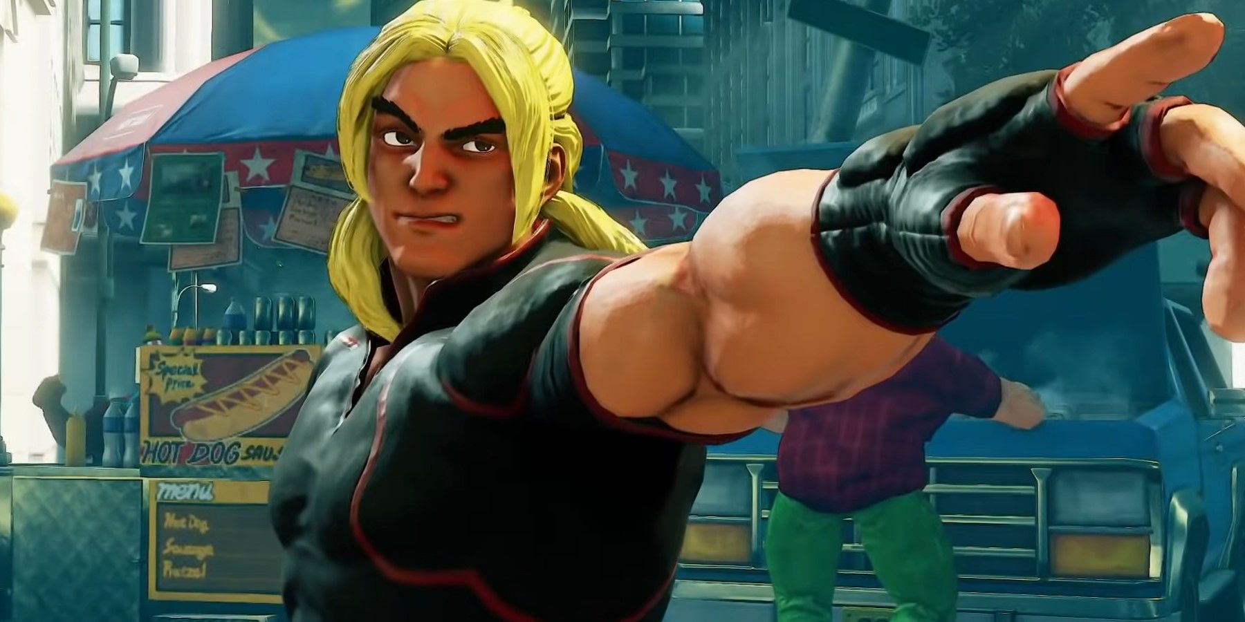 Ken pointing at his opponent with a smug smile