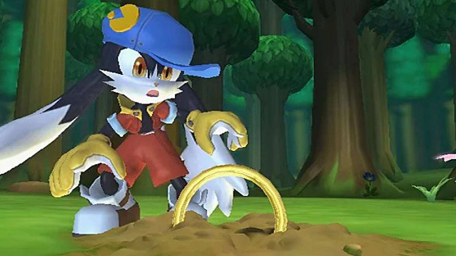 Klonoa character picking up a ring out of the ground