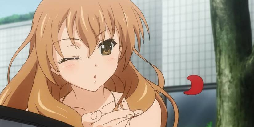 Kouko Kaga winking and blowing a kiss