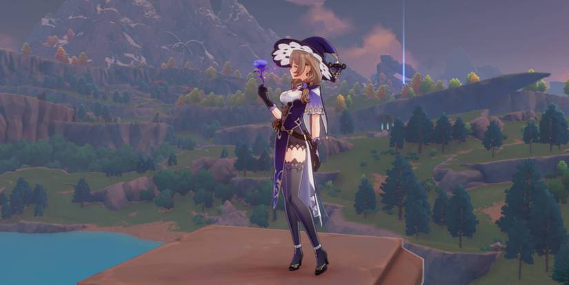 Lisa standing in a broken column and holding a rose