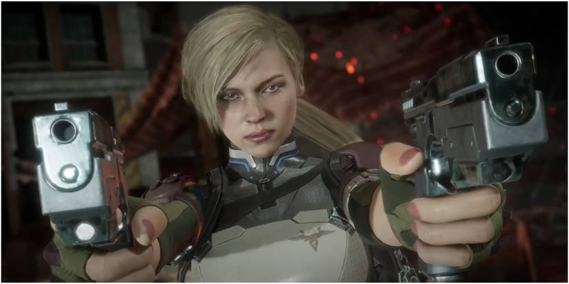 Cassie Cage aiming two pistols forward 