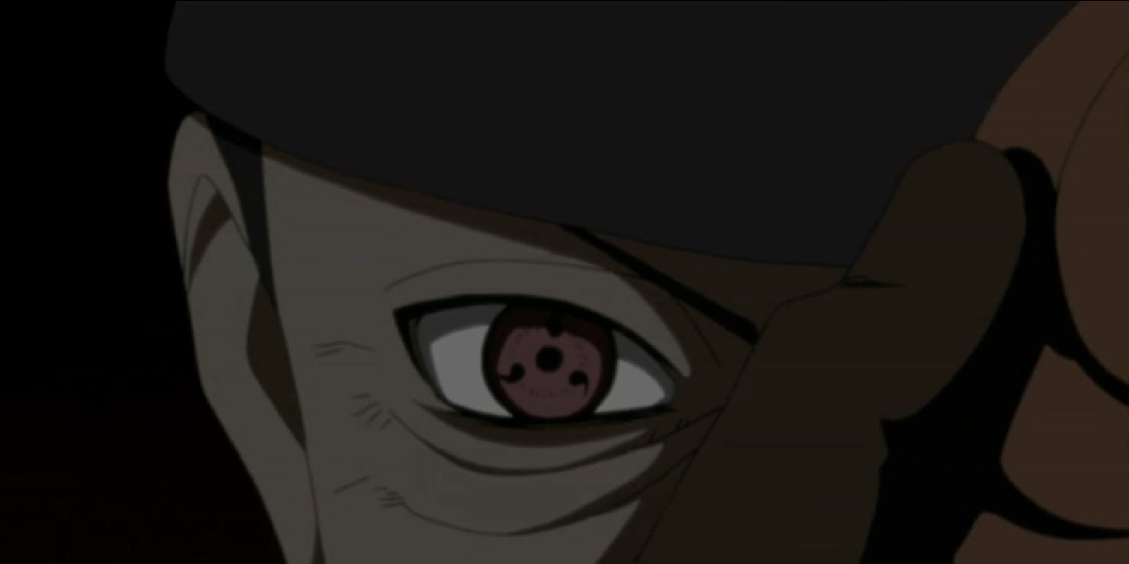 Obito Uchiha takes off his mask