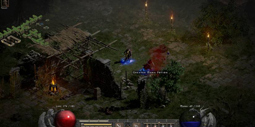 Players looking at a Potion on the ground