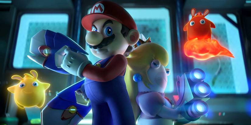 Mario + Rabbids: Sparks of Hope's Mario and Rabbid Peach standing back to back and holding guns, with two Sparks in the background