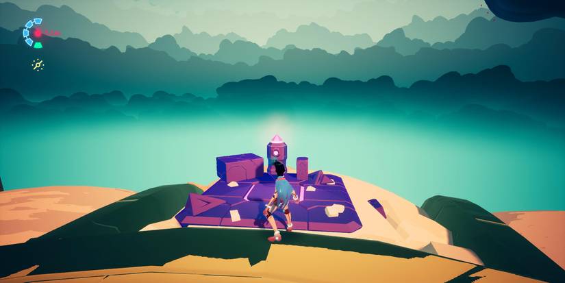 rei on top of a building with a pink and grey cache resting on a stone platform