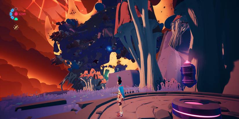 rei standing facing away from a cache on a round, stone platform with trees and rocks around 