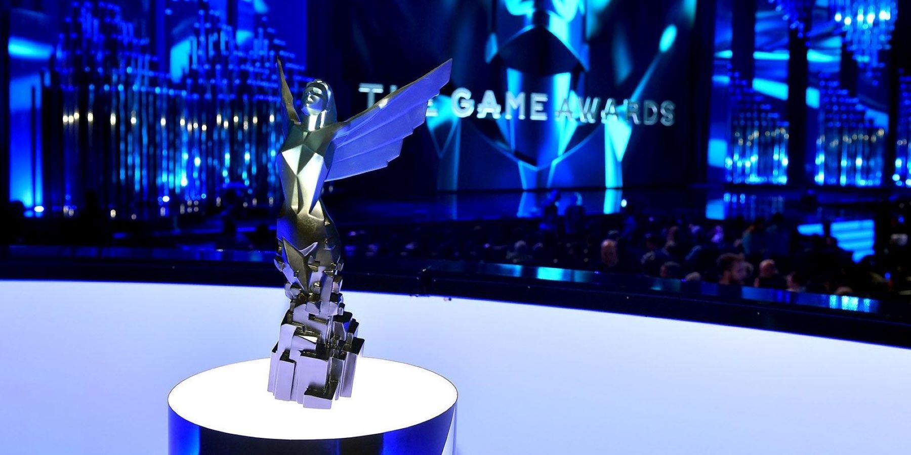 An award standing on a pedestal in front of the audience at The Game Awards 2021