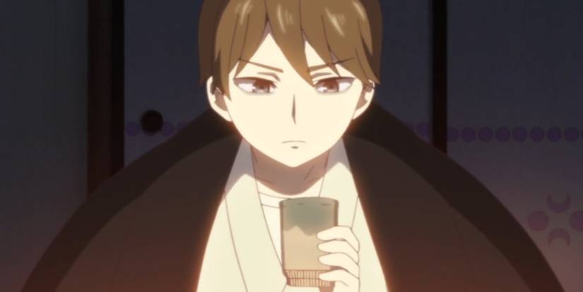 Tamahiko Shima receiving a cup from Yuzuki