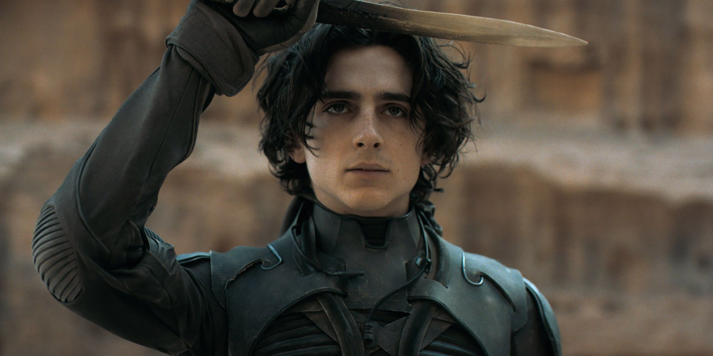 Timothee Chalamet holding a blade in Dune