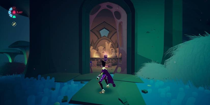 Rei standing in front of an open tower with a cylindrical diode inside the small room