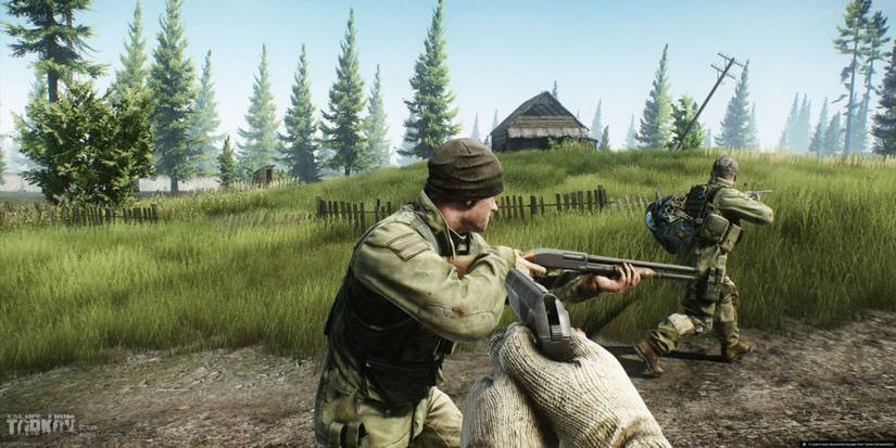 The player points their pistol at a pair of scavs in Escape from Tarkov