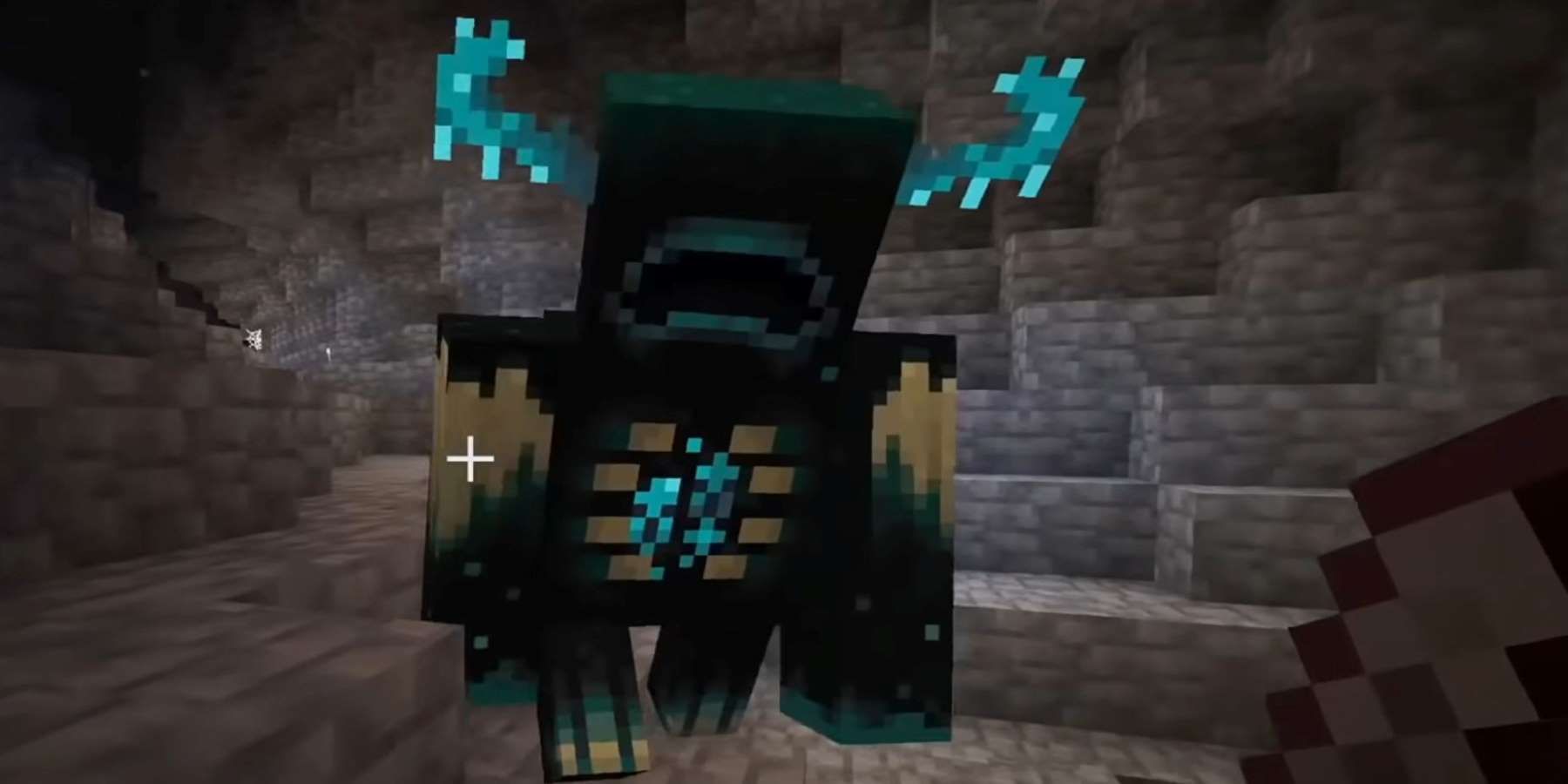 A Guardian advancing on a Minecraft player in a narrow cavern