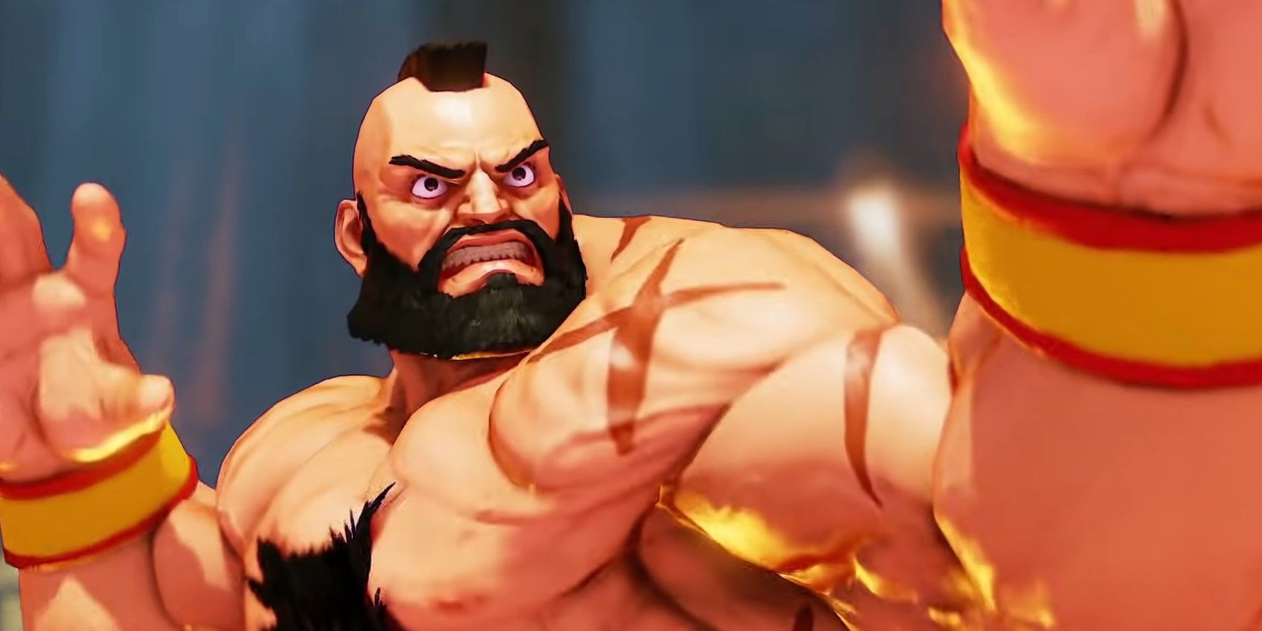 Zangief scowling at the opponent with his arms up