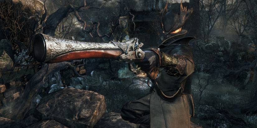 Image from Bloodborne showing the protagonist pointing the pistol off-camera.