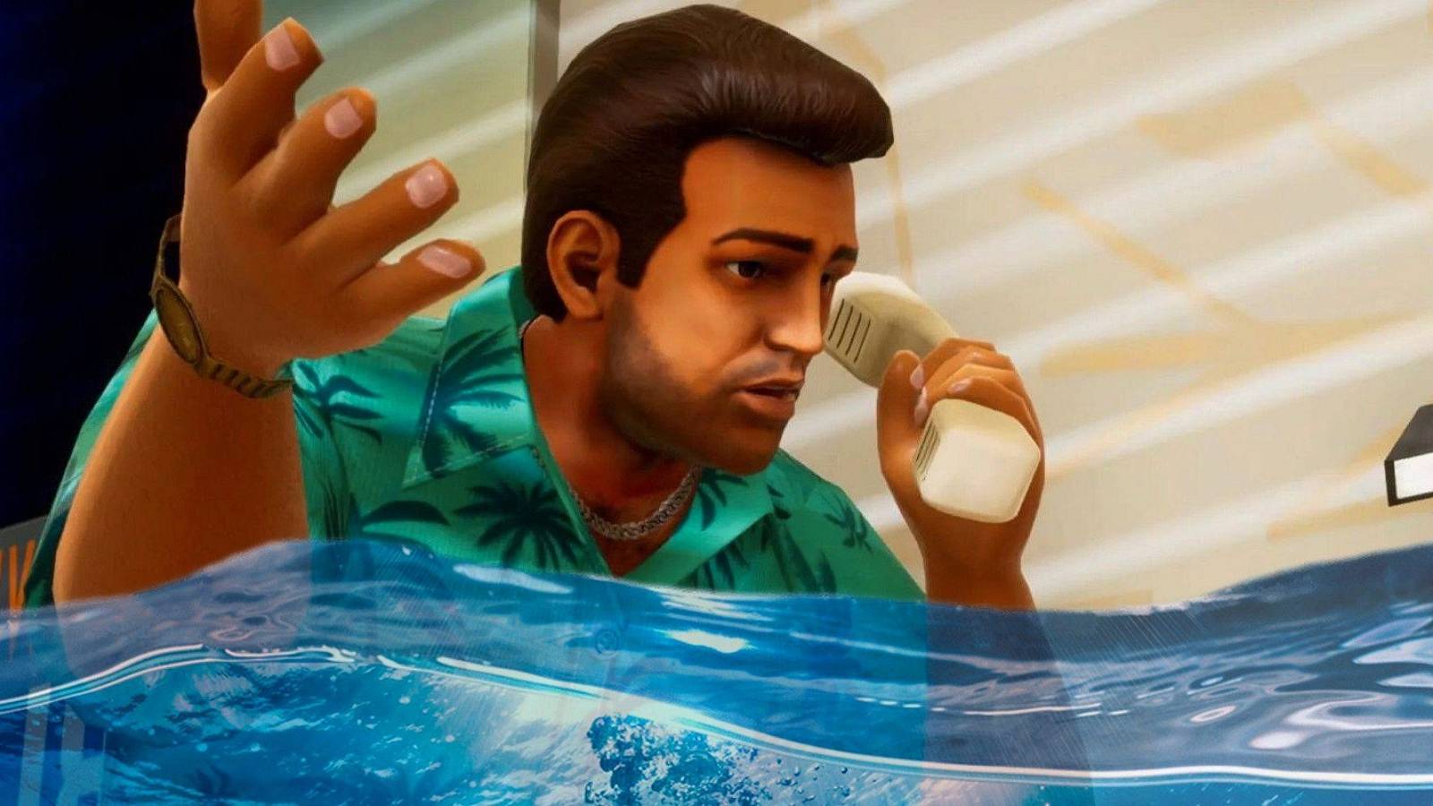 Screenshot from the GTA Trilogy showing Tommy from Vice City, with some water at the bottom of the picture.