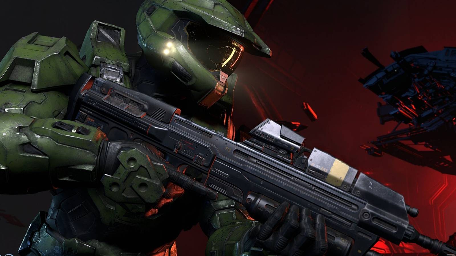 Official image of Halo character Master Chief holding an Assault Rifle.