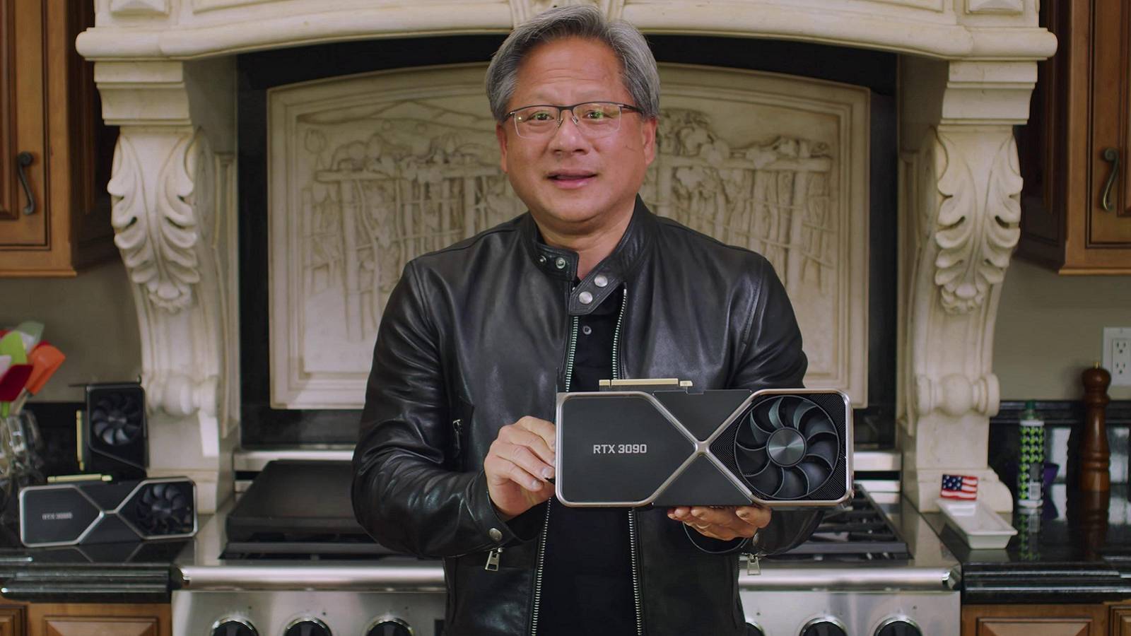 Image of Nvidia CEO Jensen Huang holding up an RTC graphics card.