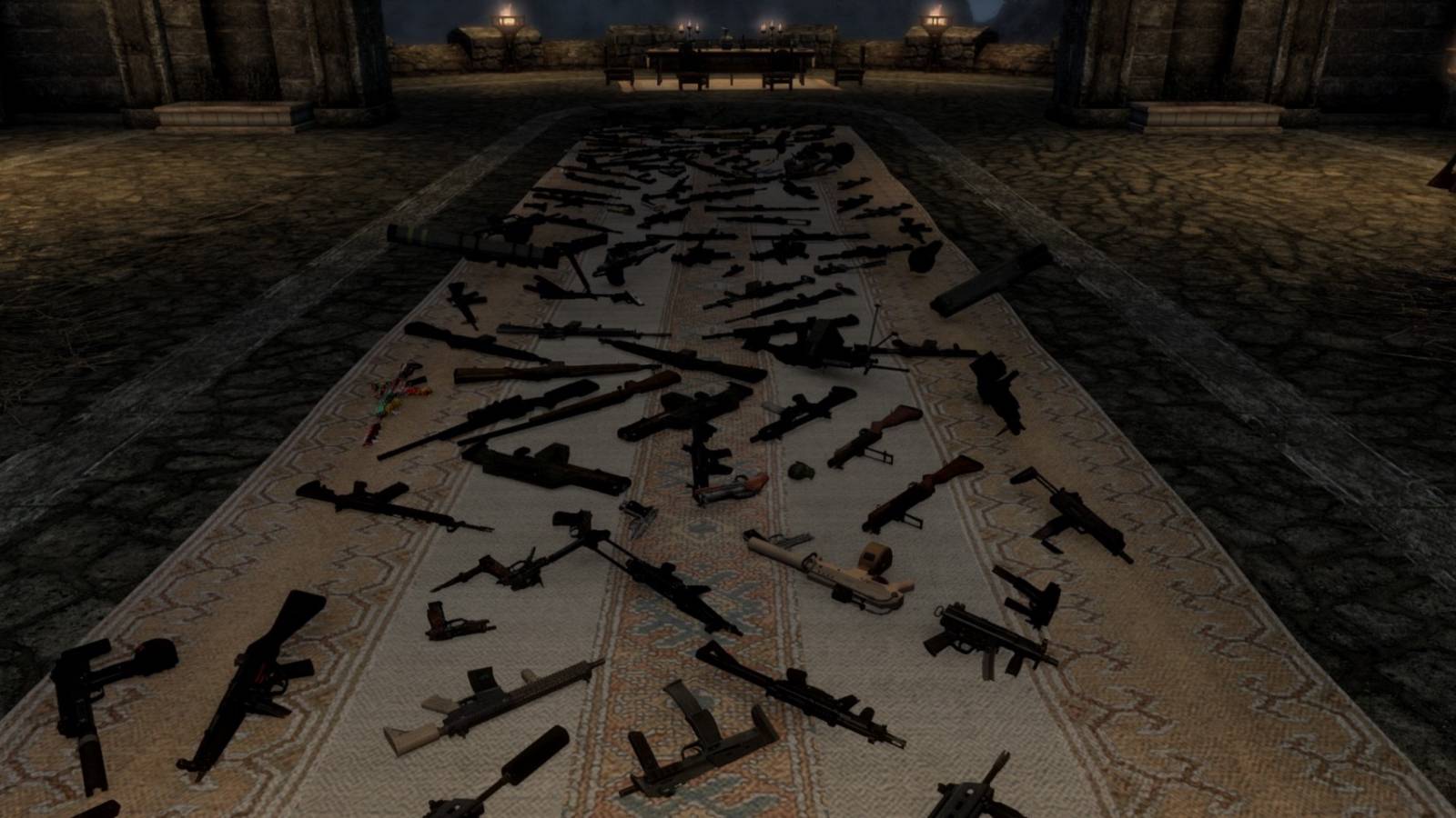 Screenshot from The Elder Scrolls 5: Skyrim showing a load of guns on the floor.