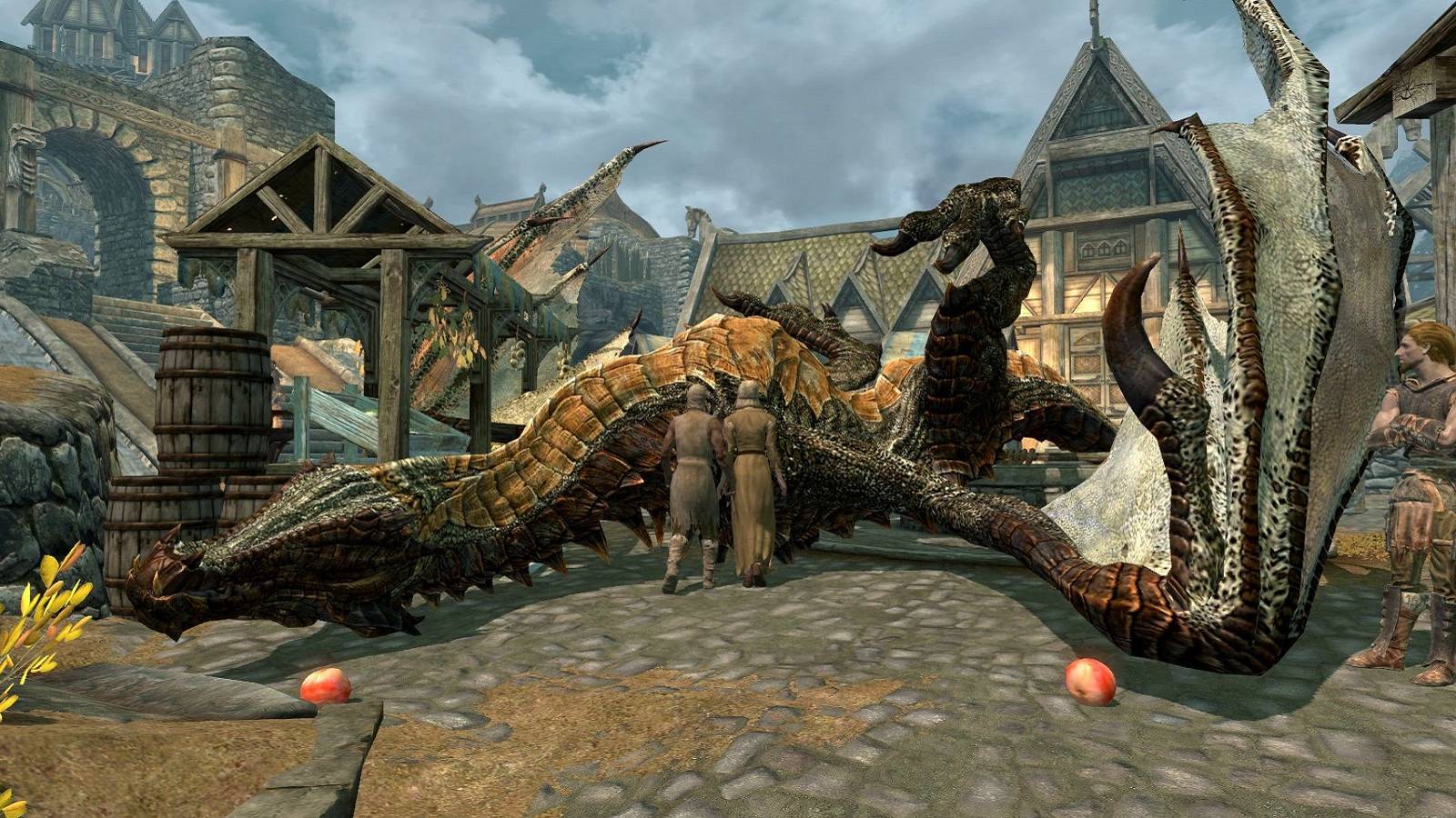 Screenshot from The Elder Scrolls 5: Skyrim showing a dragon lying dead in the middle of Whiterun.
