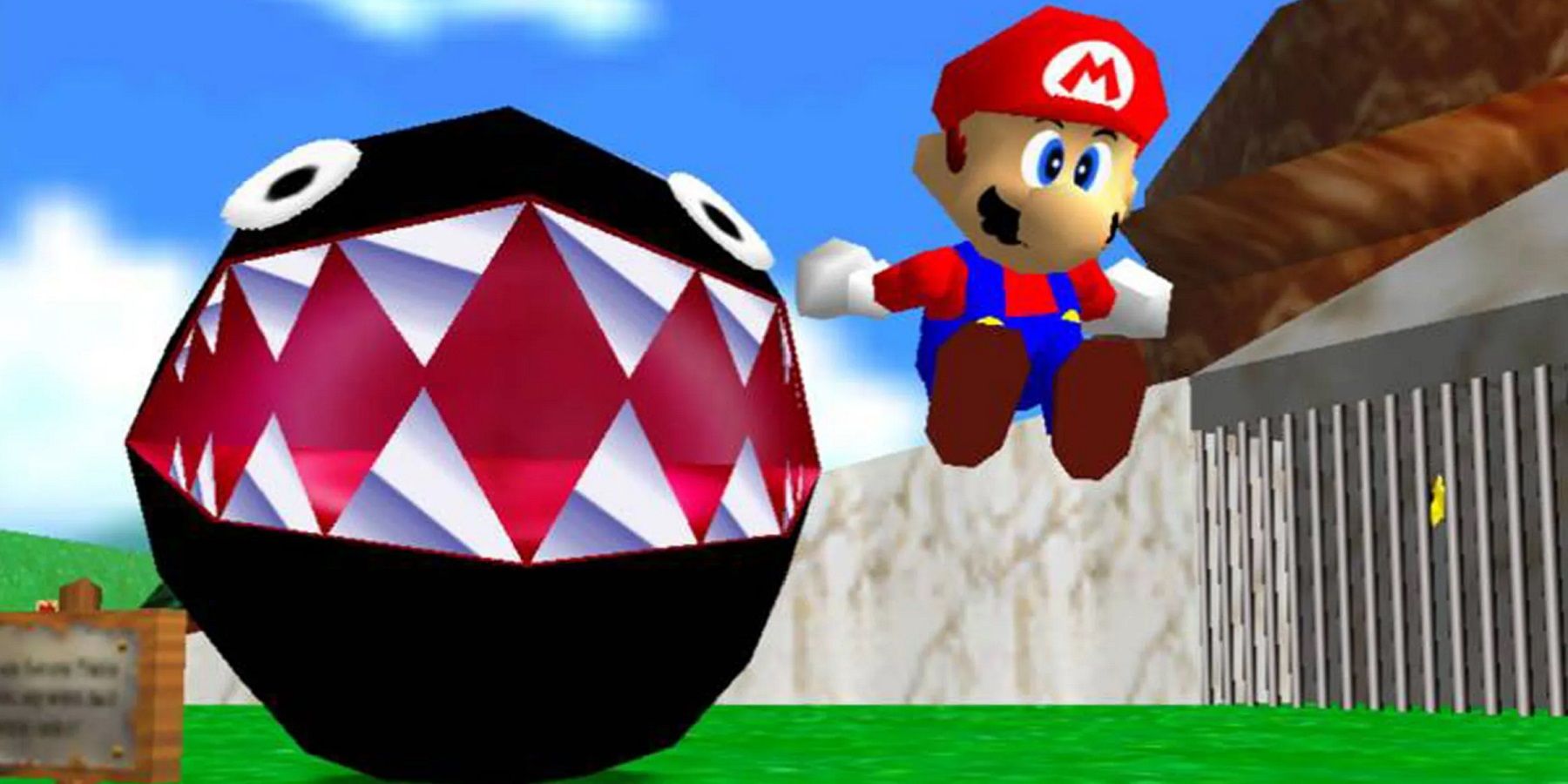 Screenshot from Super Mario 64 showing Mario leaping away from a Chain Chomp.