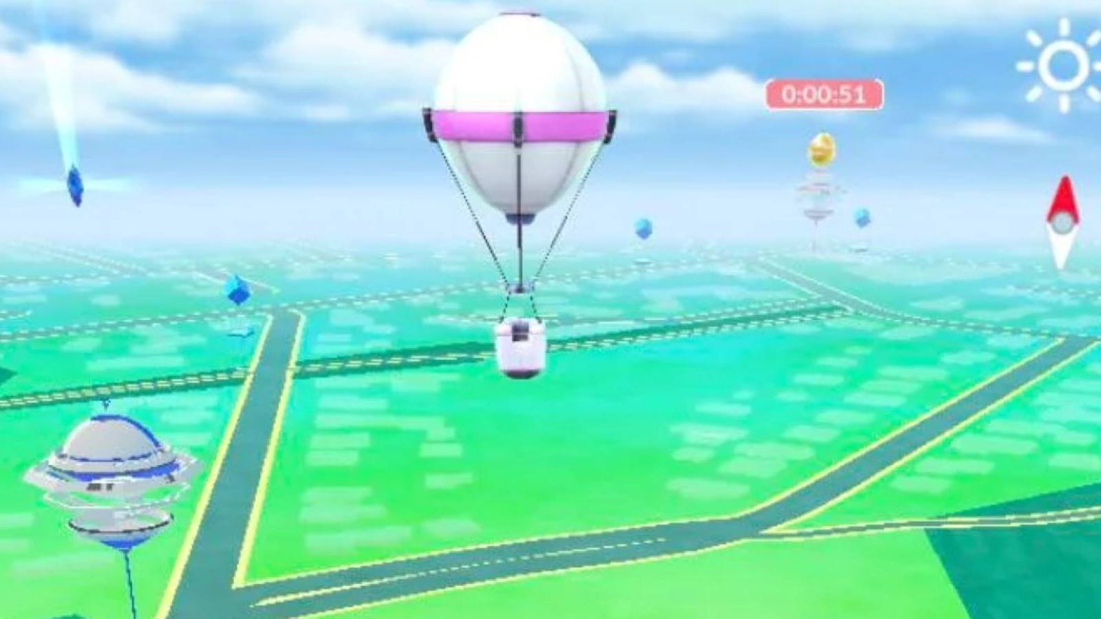 An sponsored ad balloon in Pokemon GO with Gyms and PokeStops in the background