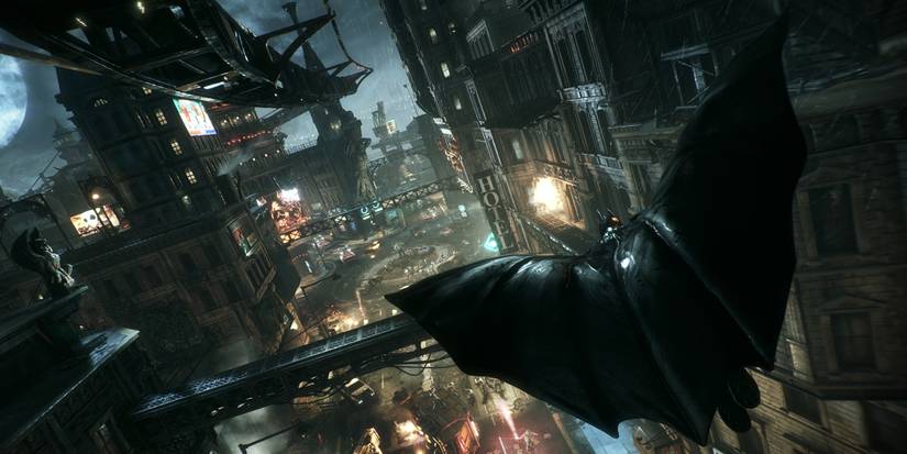 Batman: Arkham Knight screenshot showing batman soaring through the city at night