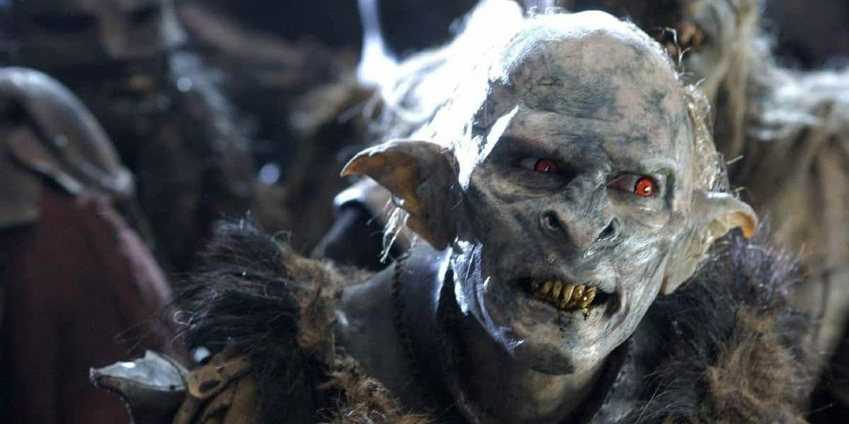 Blue Orc soldier in Lord of the Rings movie looking off to the side
