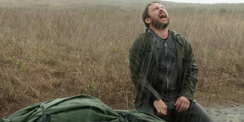 Charlie breaks down next to his dad's corpse in It's Always Sunny