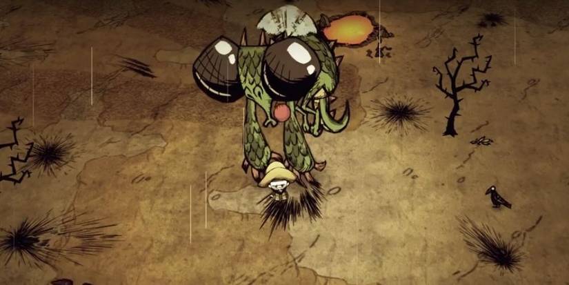 Wilson using a Water Balloon against a Dragonfly in Don't Starve Together.