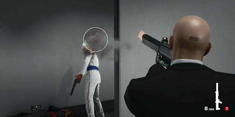 Agent 47 shoots a guard using the silenced Enram HV Covert Mk II in Mumbai