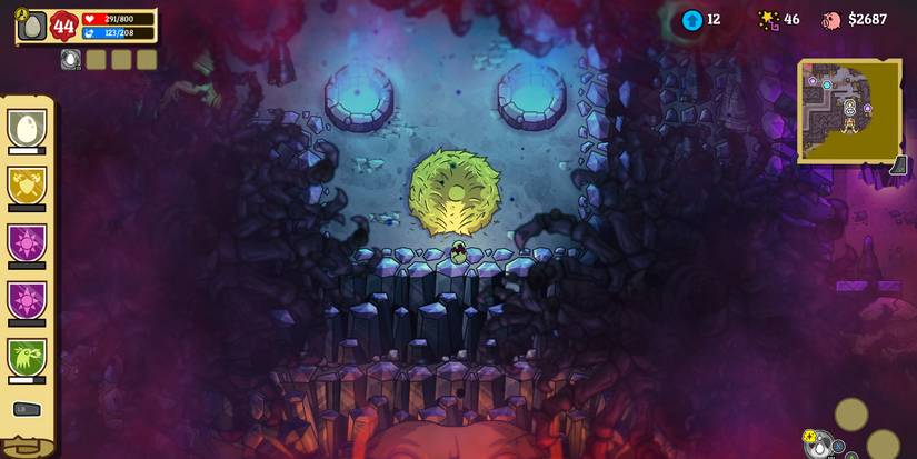 a small, cracking egg in front of a large bird's nest that sits at the top of a dark, spooky cliff