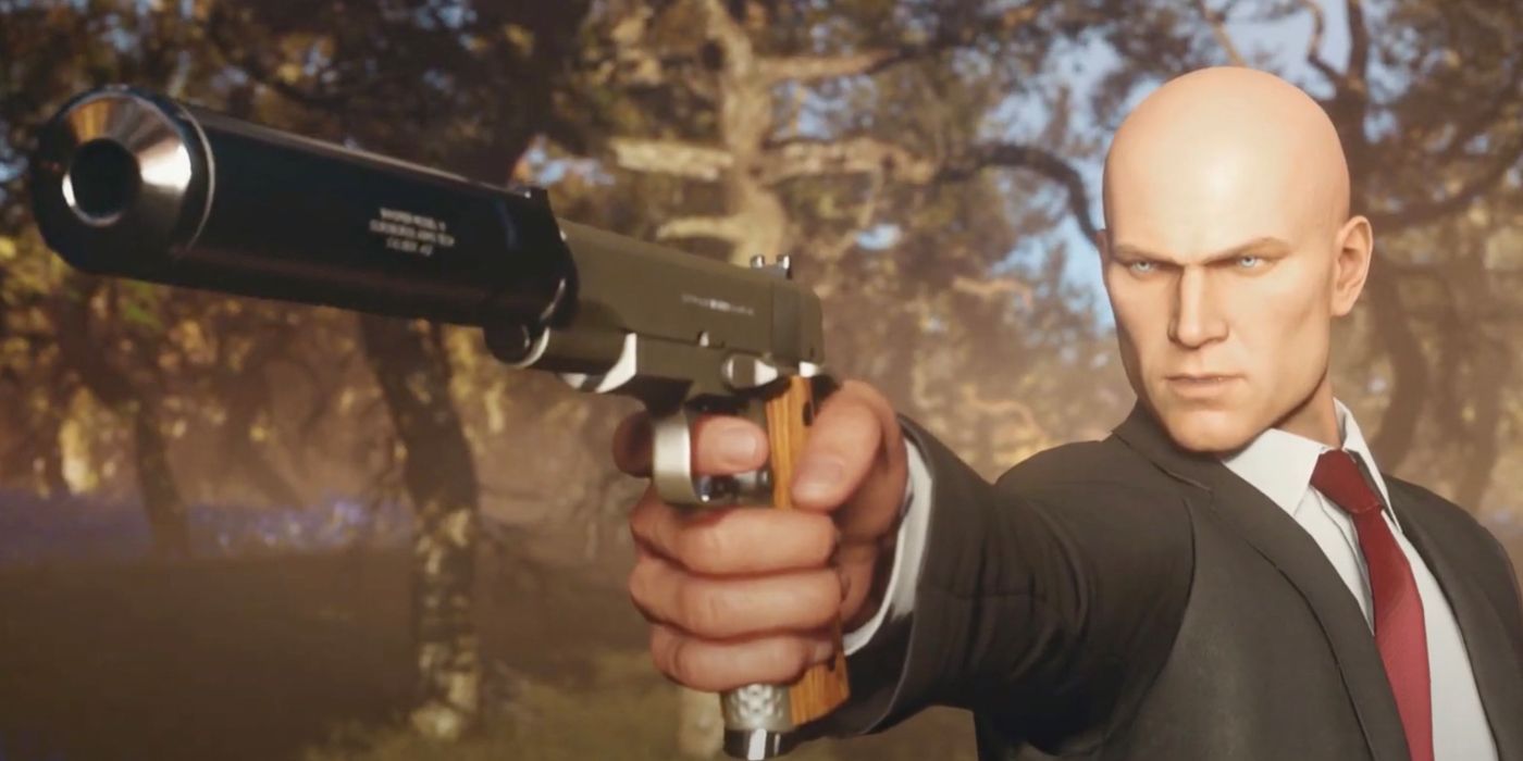 Agent 47 aims using the ICA19 Silverballer pistol in the video game Hitman