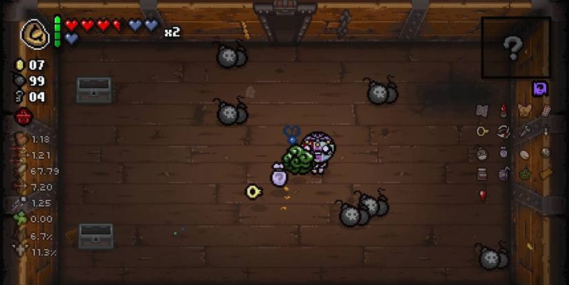 The Binding of Isaac: Repentance. Issac stands in the middle of the room, surrounded by bomb pickups. Extra UI elements are displayed.