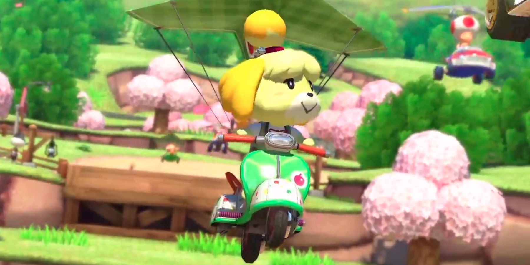 Isabelle gliding with a motorcycle on the Animal Crossing track from Mario Kart 8 Deluxe