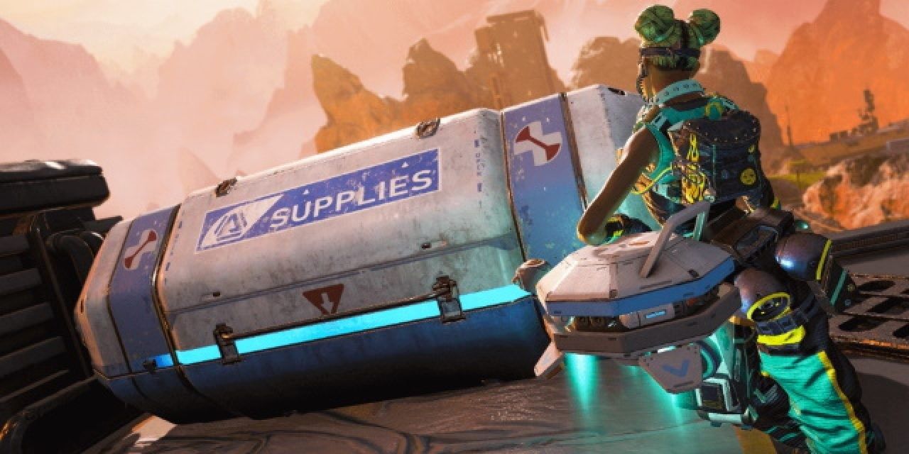 Lifeline and her health drone DOC run toward a supply bin in Apex Legends on Kings Canyon