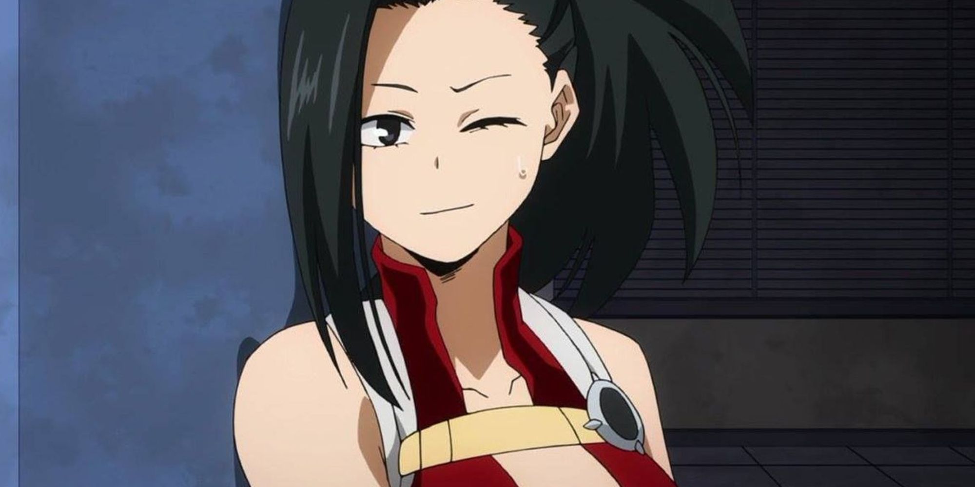 Momo winking in her hero outfit in My Hero Academia