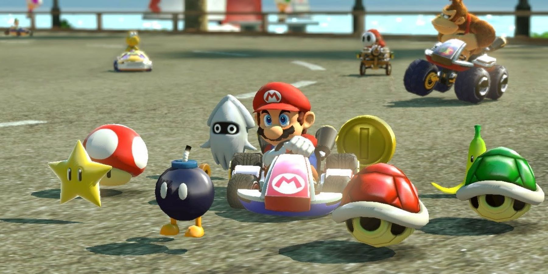 Mario driving a kart in Mario Kart 8 and using the Crazy Eight item, with Donkey Kong, Shy Guy, and Koopa Troopa in the background