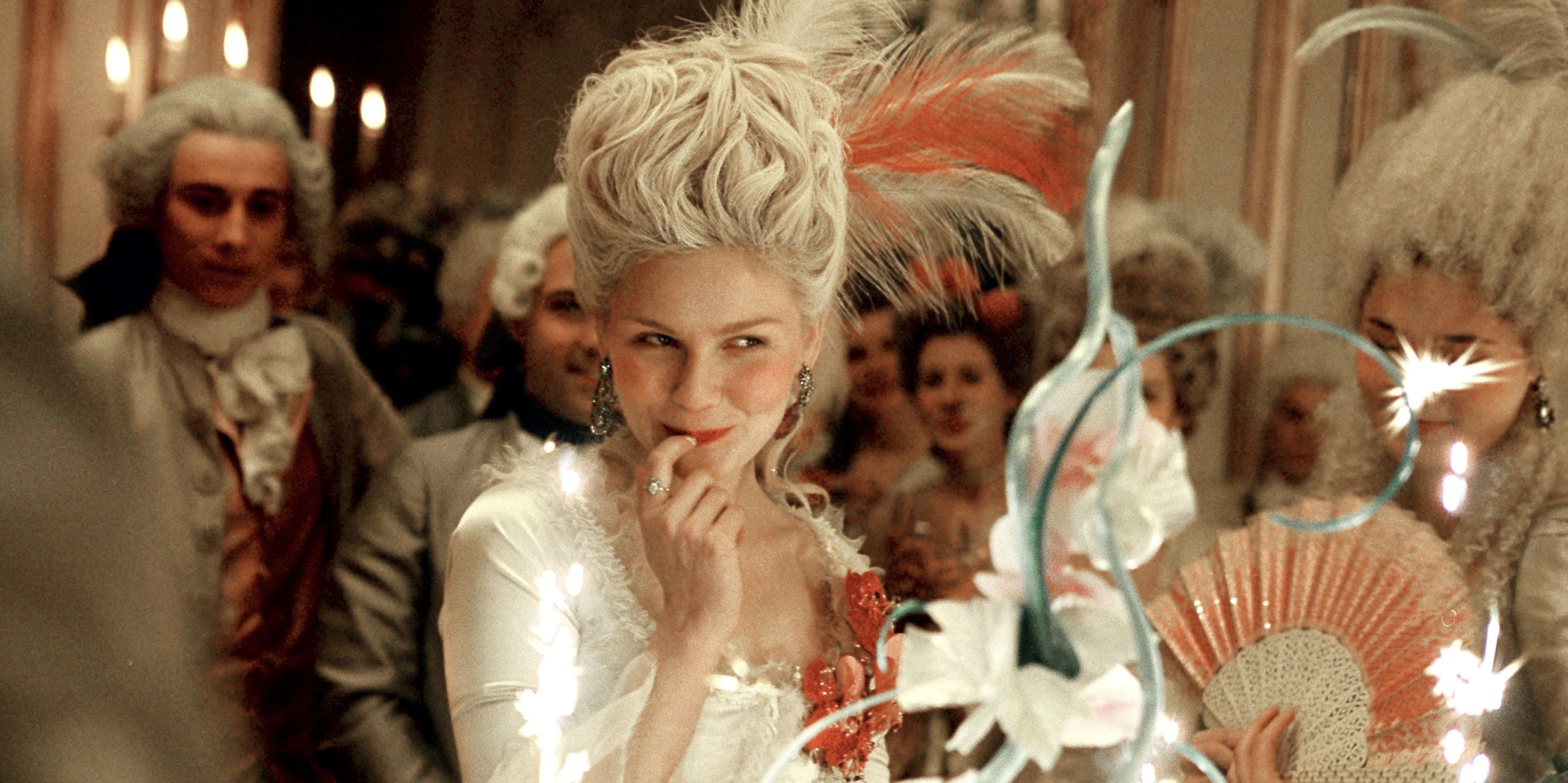Marie Antoinette smirks among a crowd wearing powdered wigs at Versailles during a party