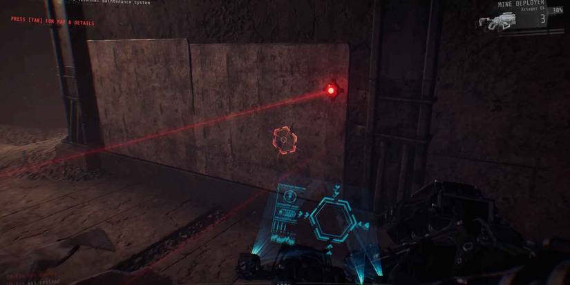 Using the Mine Deployer to place mines on the wall in GTFO