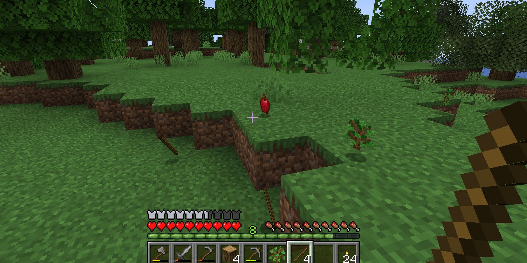 Minecraft-gathering-sticks-apples-and-saplings-from-trees